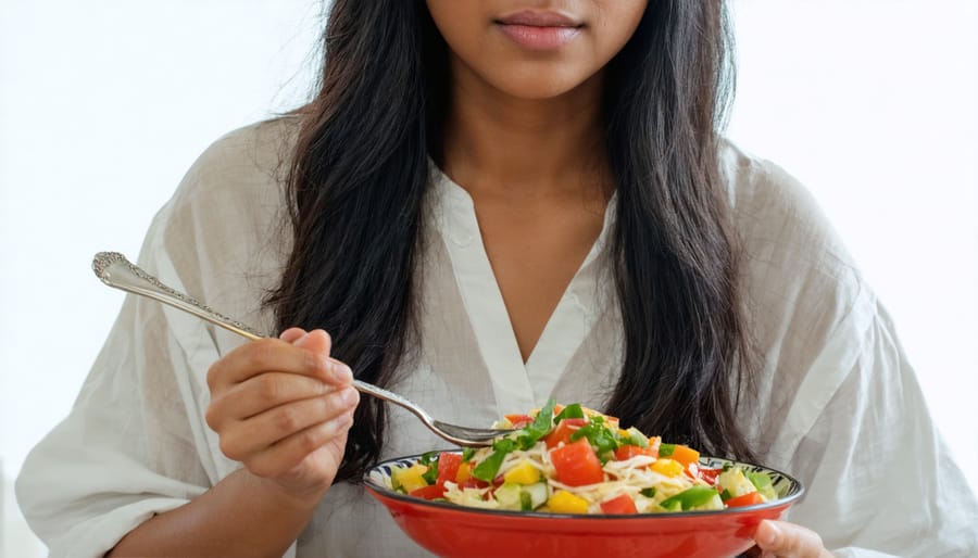 Individual practicing mindful eating with a serene expression while seated at a dining table
