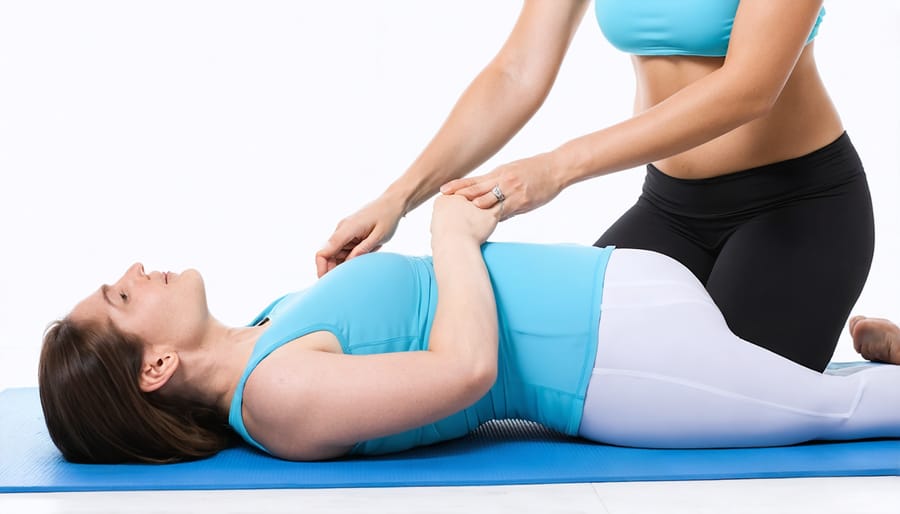 Healthcare professional guiding a patient through therapeutic exercises in a clinical setting